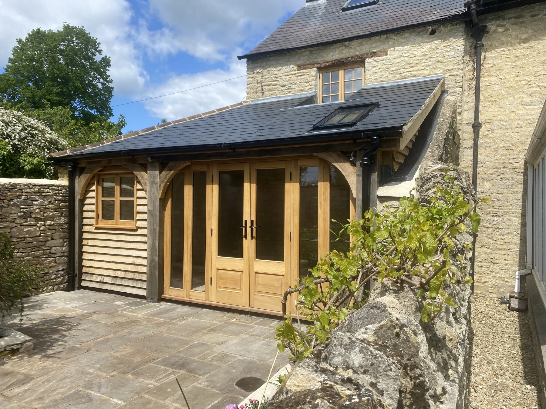 Oak-framed garden room with glazed doors